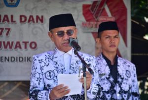 Saipul A. Mbuinga Melakukan Peringatan Hari Guru Nasional Dan HUT Ke 77 PGRI Tingkat Kabupaten Pohuwato
