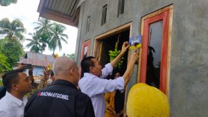 Secara Simbolis, Rustam Hs. Akili Laksanakan Pemasangan Pening di Kecamatan Mootilango
